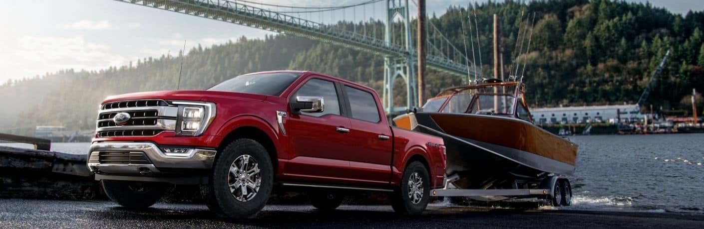 Red Ford F-150 with Trailer